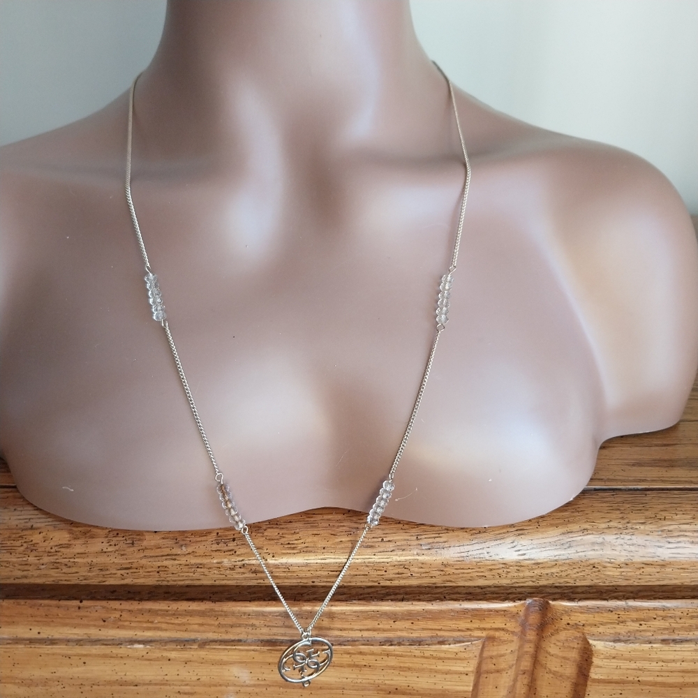 Guess Gold and Crystal Pendant Necklace - Picture 3 of 13